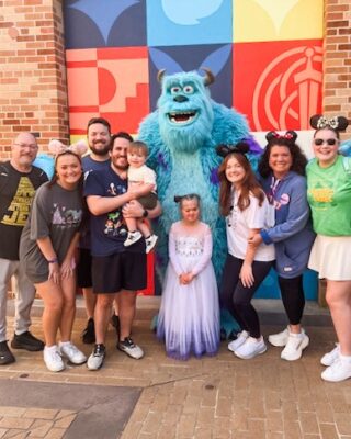 Molly and family with Sully of Monster's Inc.