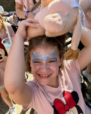 Emory having fun and having her face painted.